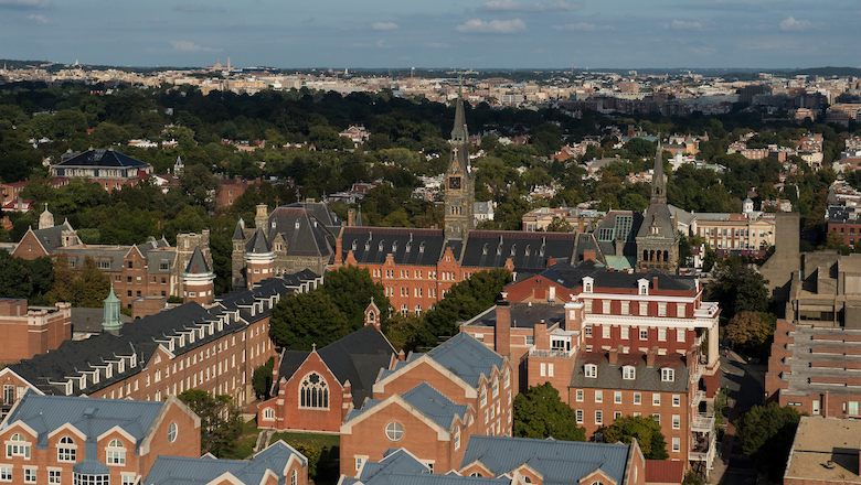 Aerial shot of the Georgetown University campus looking toward the city