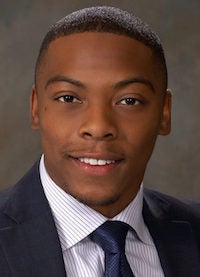 Raynard Ware in an official portrait style photo.