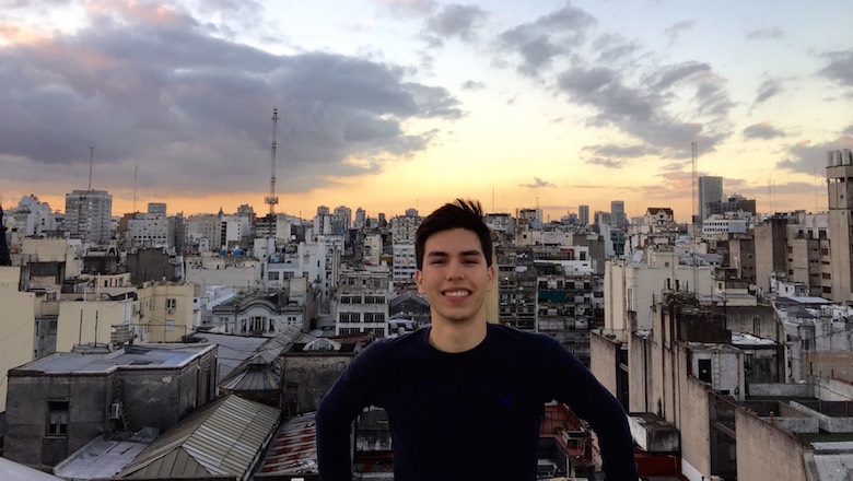 Jonathan Picos with the rooftops of Buenos Aires behind him