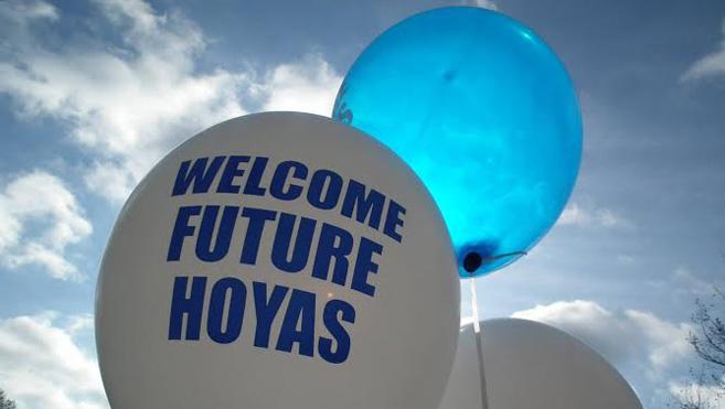 Balloons in blue and white say Welcome Future Hoyas