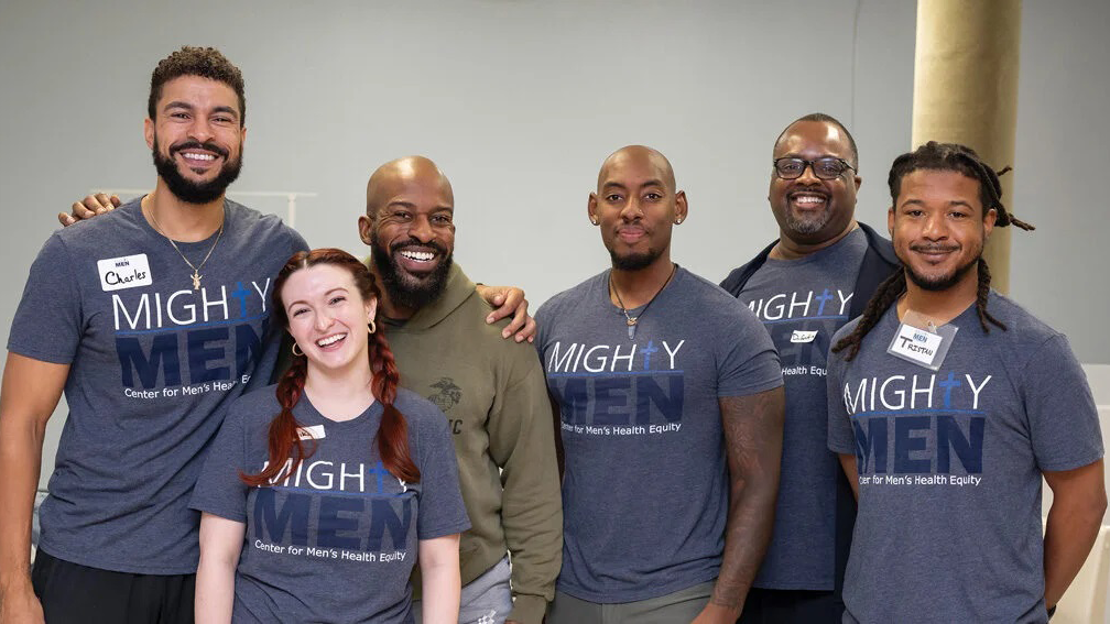 Six individuals who are personal trainers for Mighty Men, a program of the Center for Men's Health Equity, stand together
