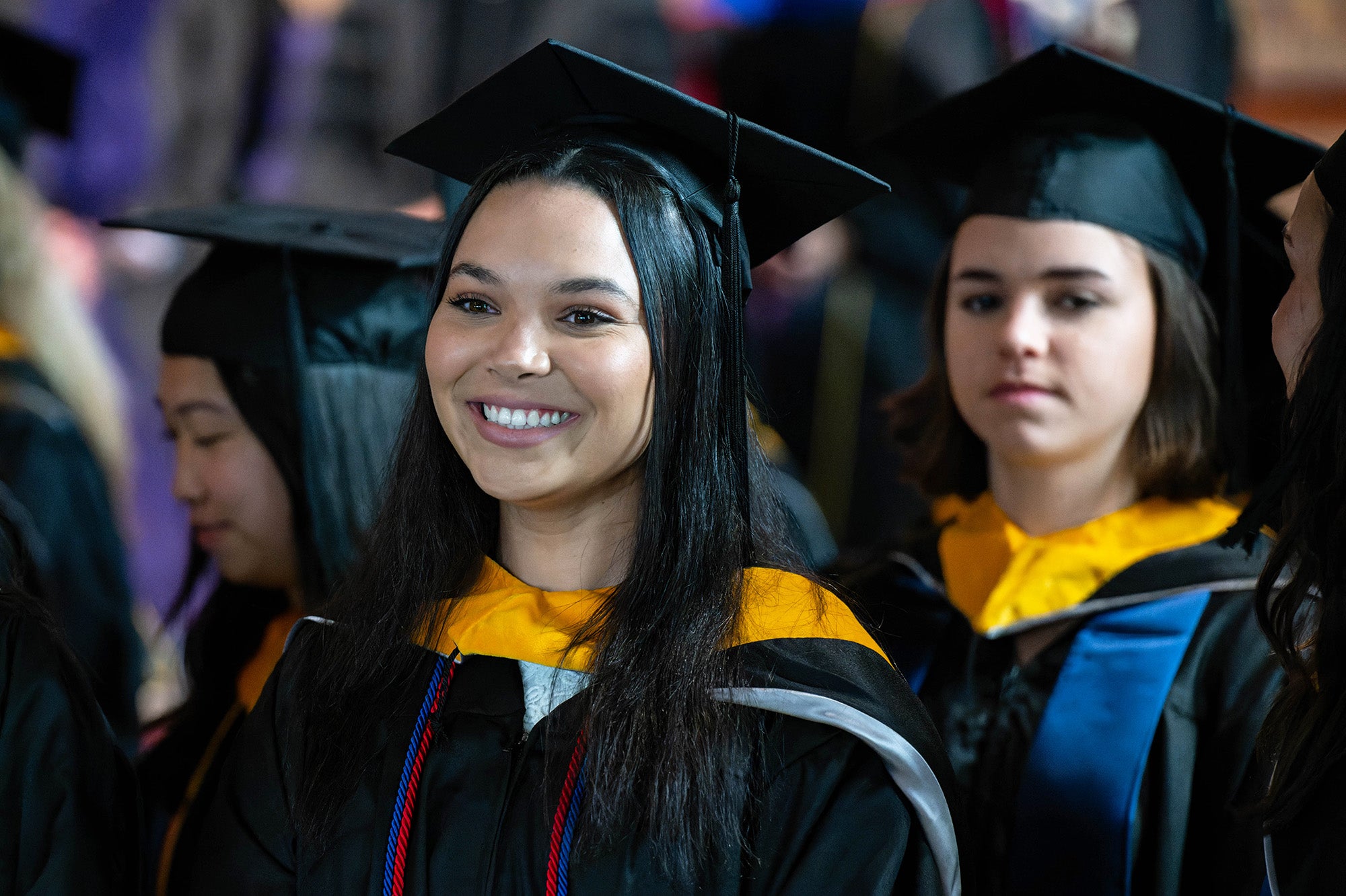 Master of Science graduates smile