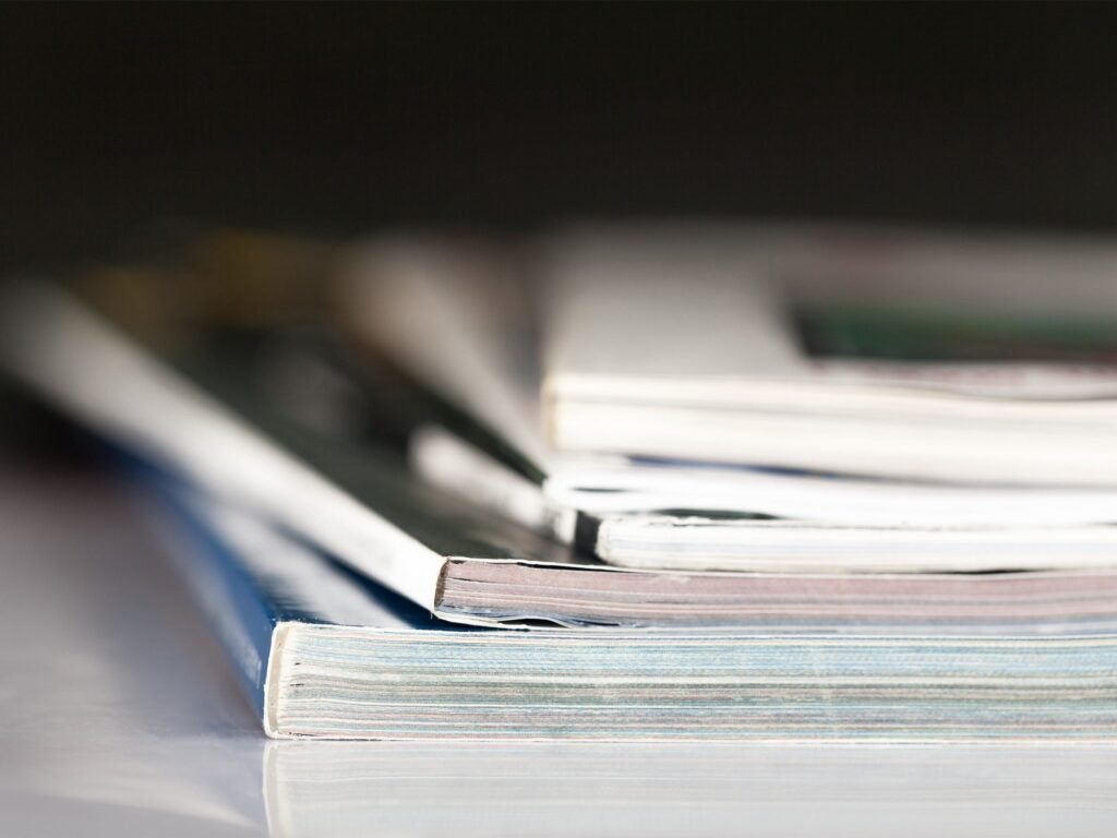 Closeup of a stack of research journals