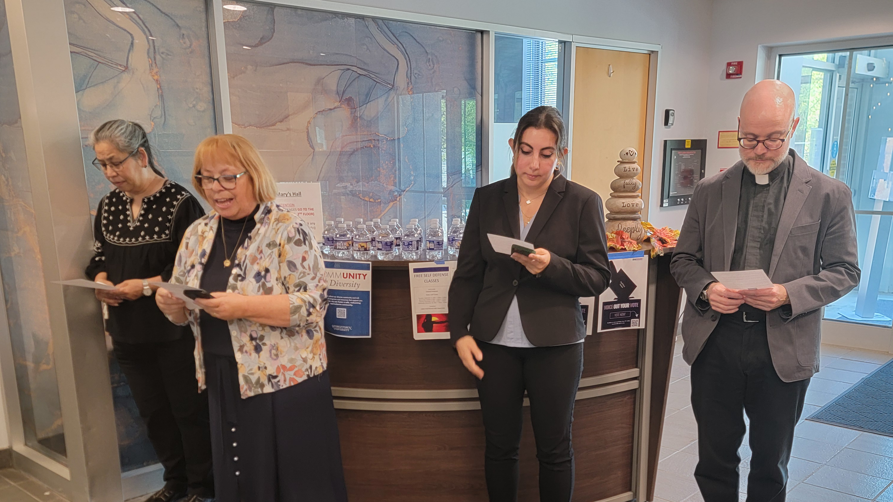 The School of Health and School of Nursing Chaplain, Sister Celeste Mokrzycki, blessing the new Meditation Room.