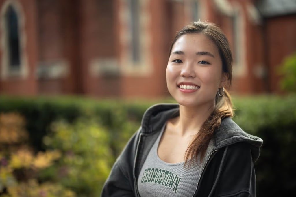 Ashley Jeong (H'26) standing outside on Georgetown's campus