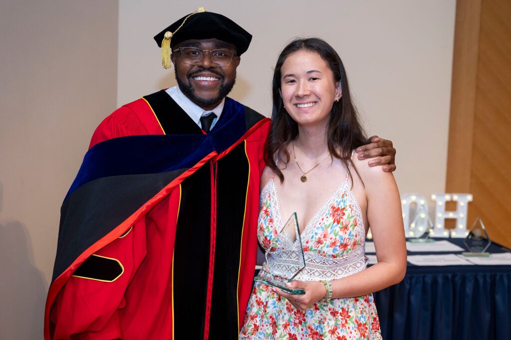 Dean Christopher King stands with Tara Haas