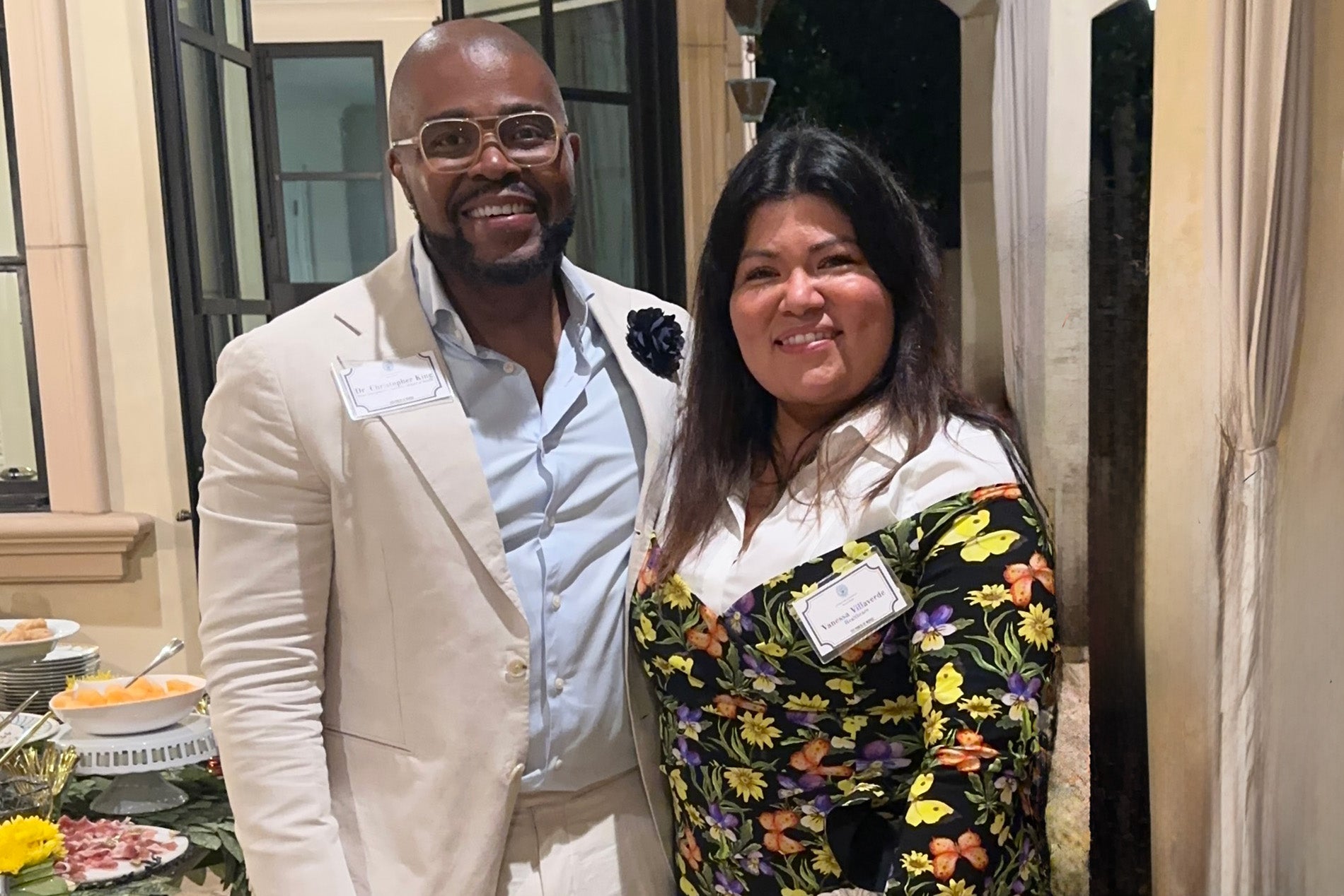 King stands with Vanessa Villaverde 