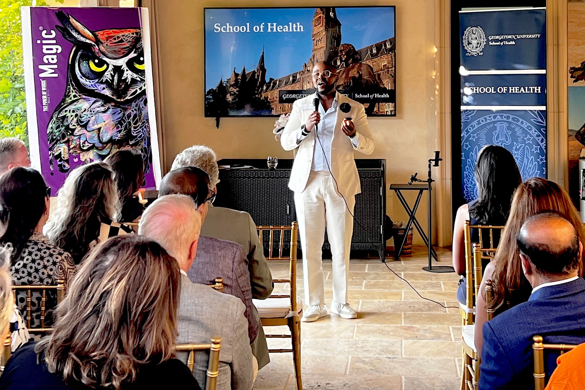 Christopher King speaks to an audience