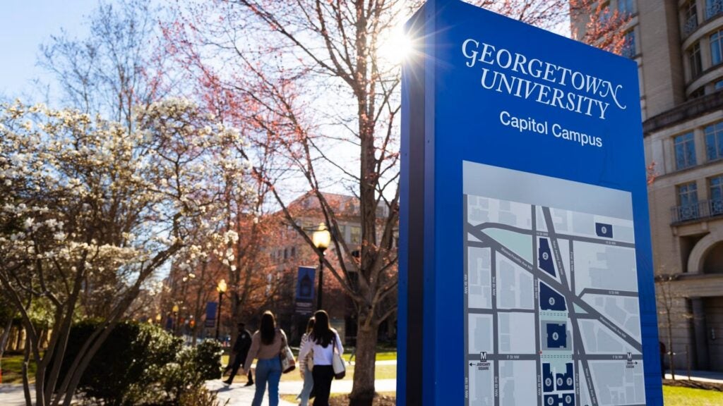 A view of the Capitol Campus including a wayfinding sign