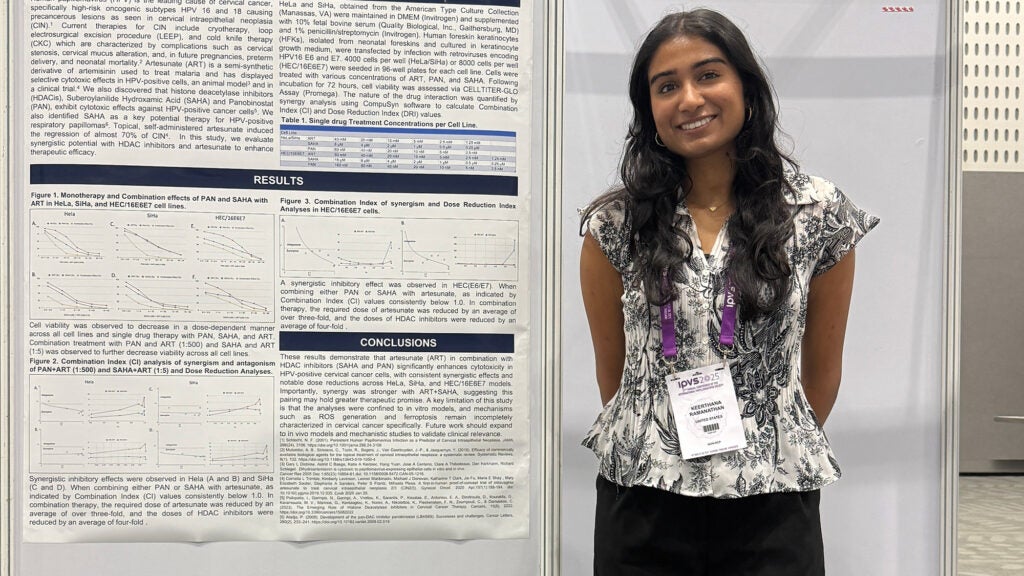 Keerthana Ramanathan with her poster at the conference