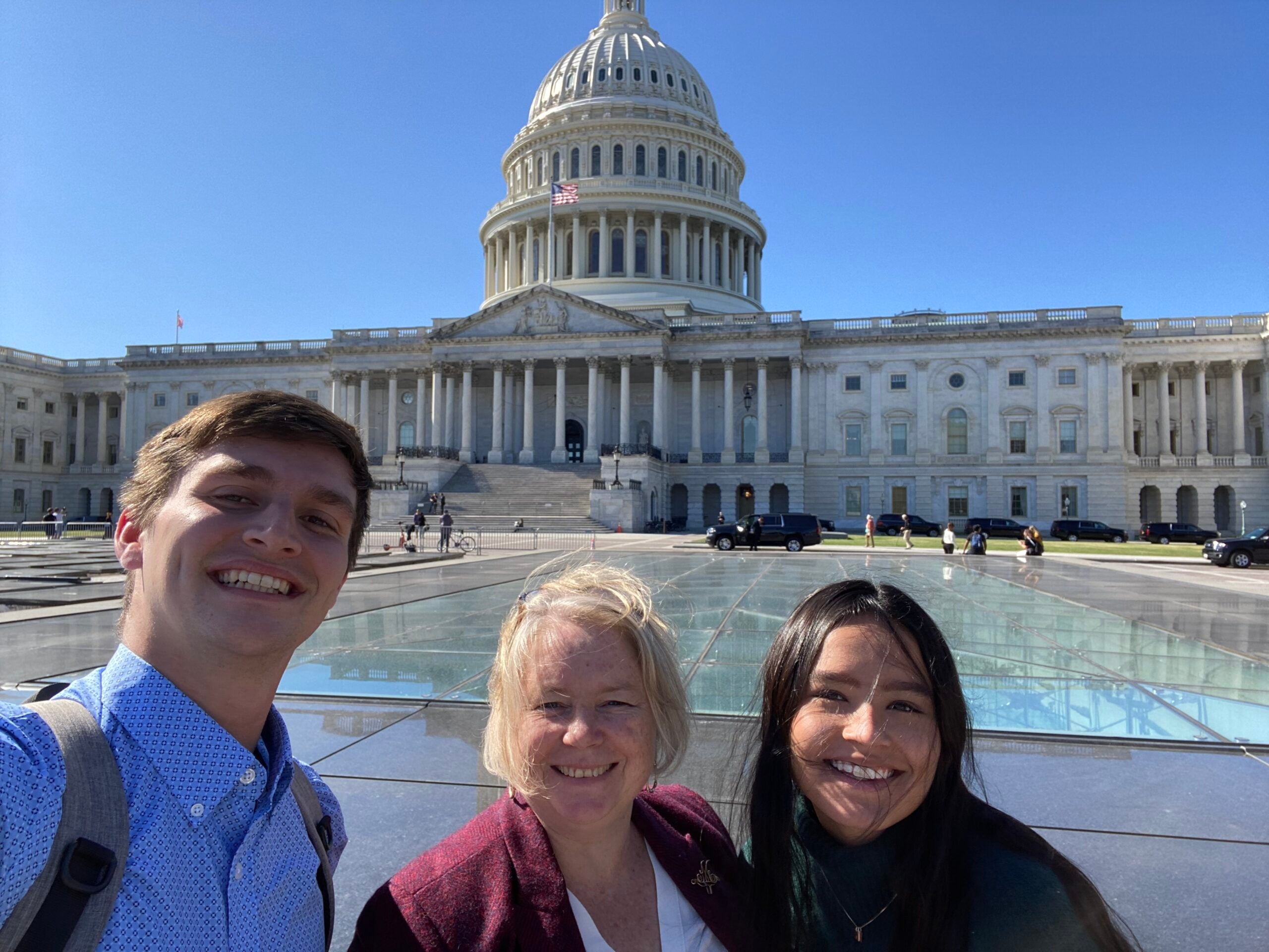 Margaret Baker and students in front of US Capitol building