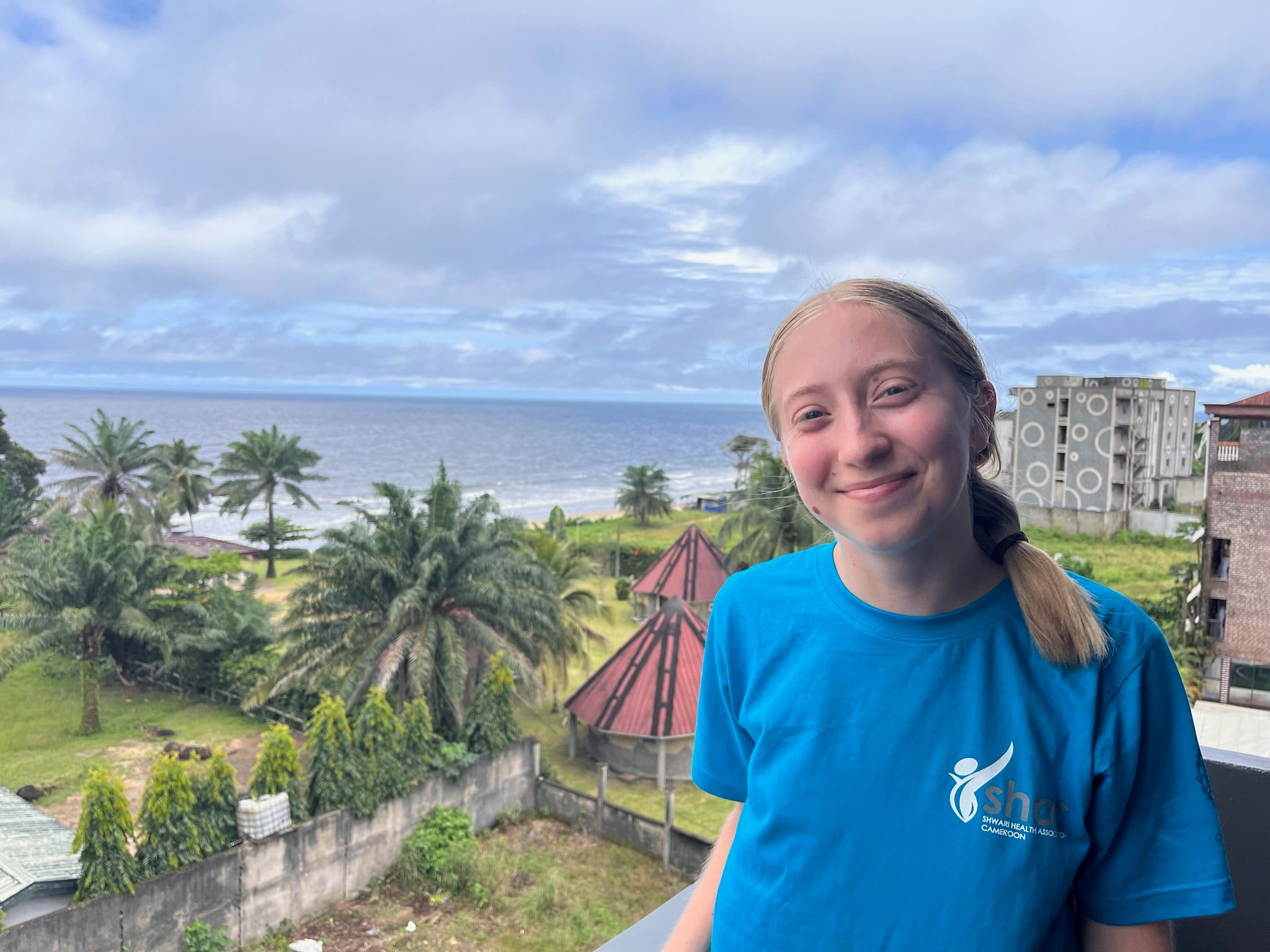 Chloe Hammock in Yaounde, Cameroon with ocean in background