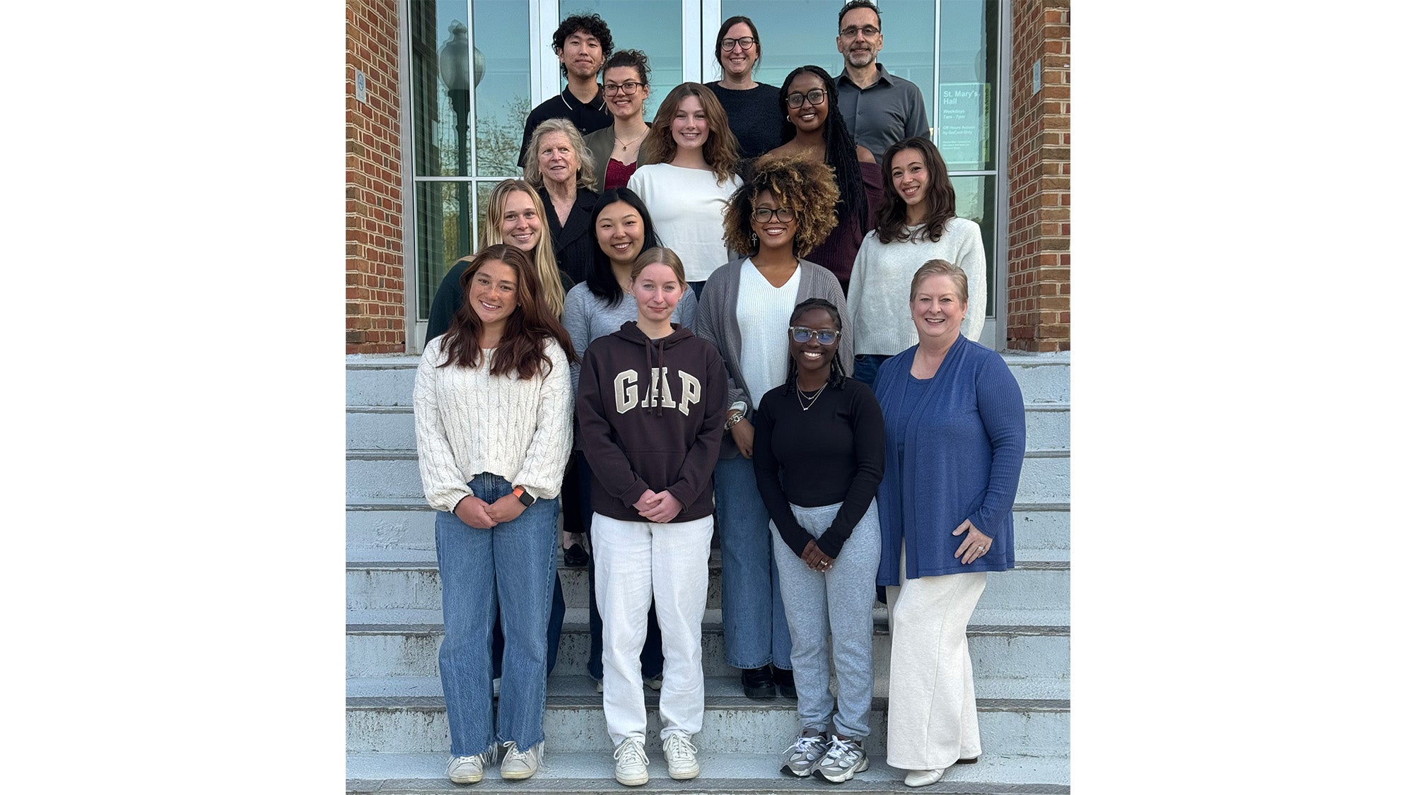 A group of School of Health Human Science students stand with Dean Padmore, Chair Pablo Irusta and another faculty member on the steps of St. Mary's Hall