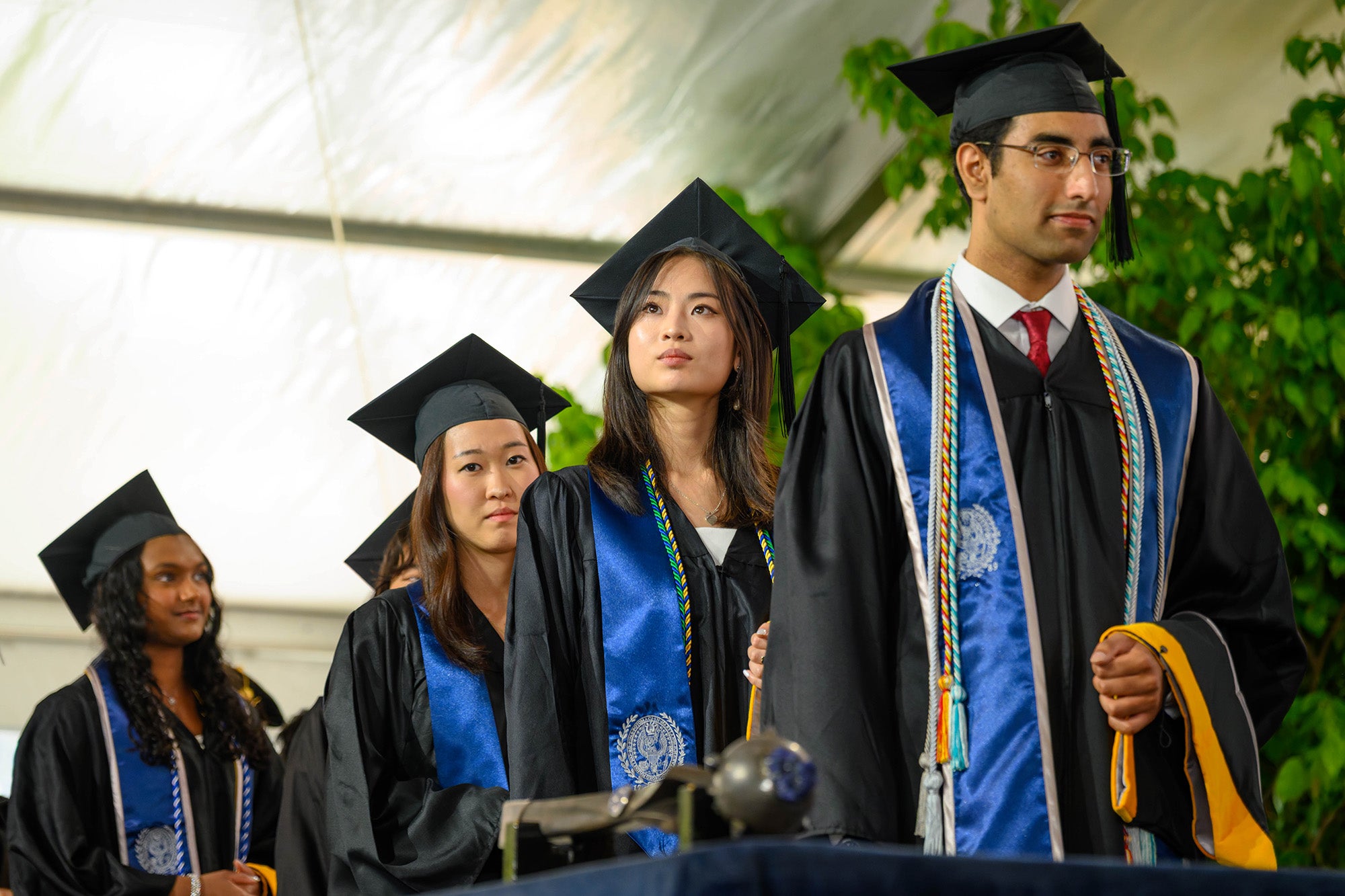 Students wait in line to walk the stage